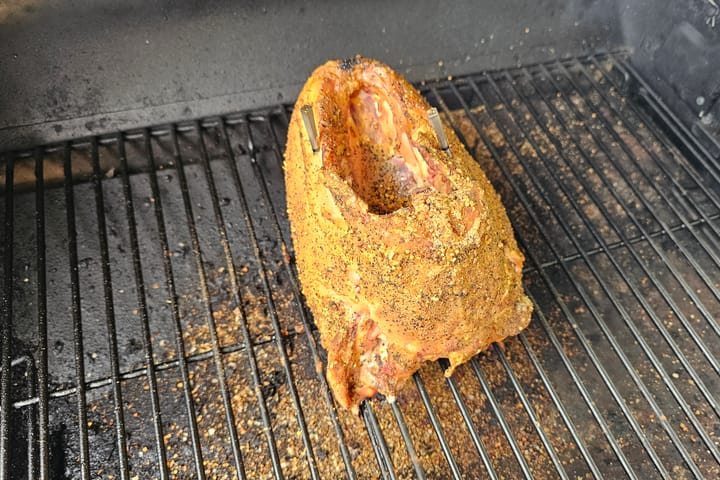 A rubbed piece of meat on the grate