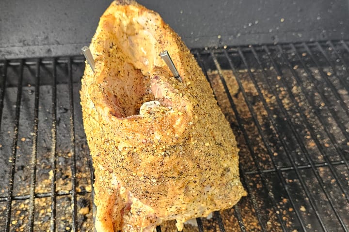 A rubbed piece of meat on the grate