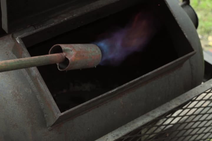 The torch lighting the firebox